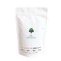 White coffee bag with 'Treeology' branding on a white background