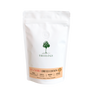 White coffee bag with Treeology branding on a white background